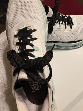 Skechers Women's White Sneakers with Black Laces and Mint colored pretty shoe 11